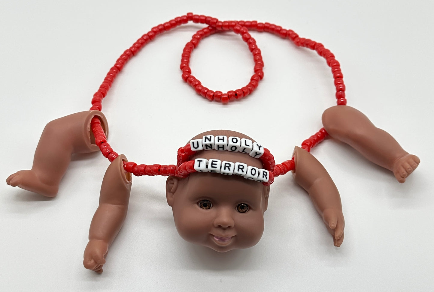 Unholy Terror Baby Doll Necklace